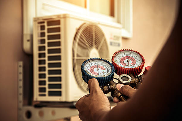 Professional Hvac technician working in El Paso, IL